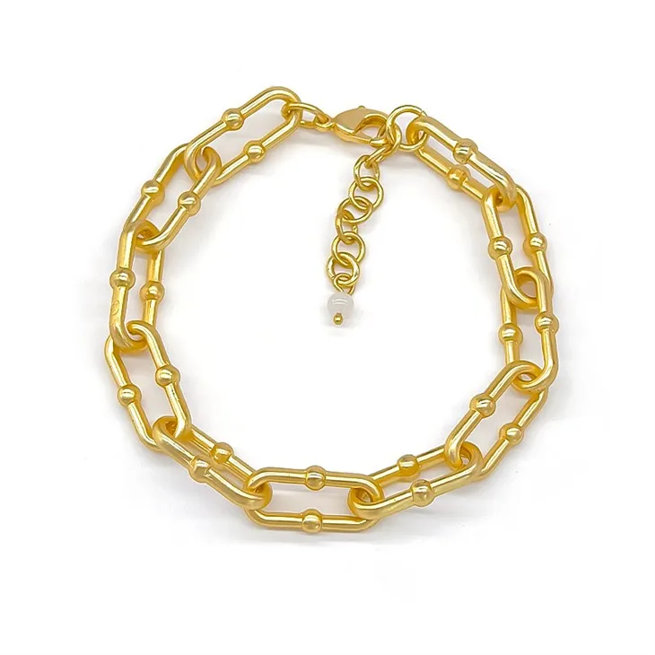 Bracciale con graffetta dorata